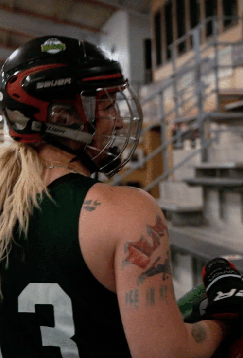 woman in hockey gear